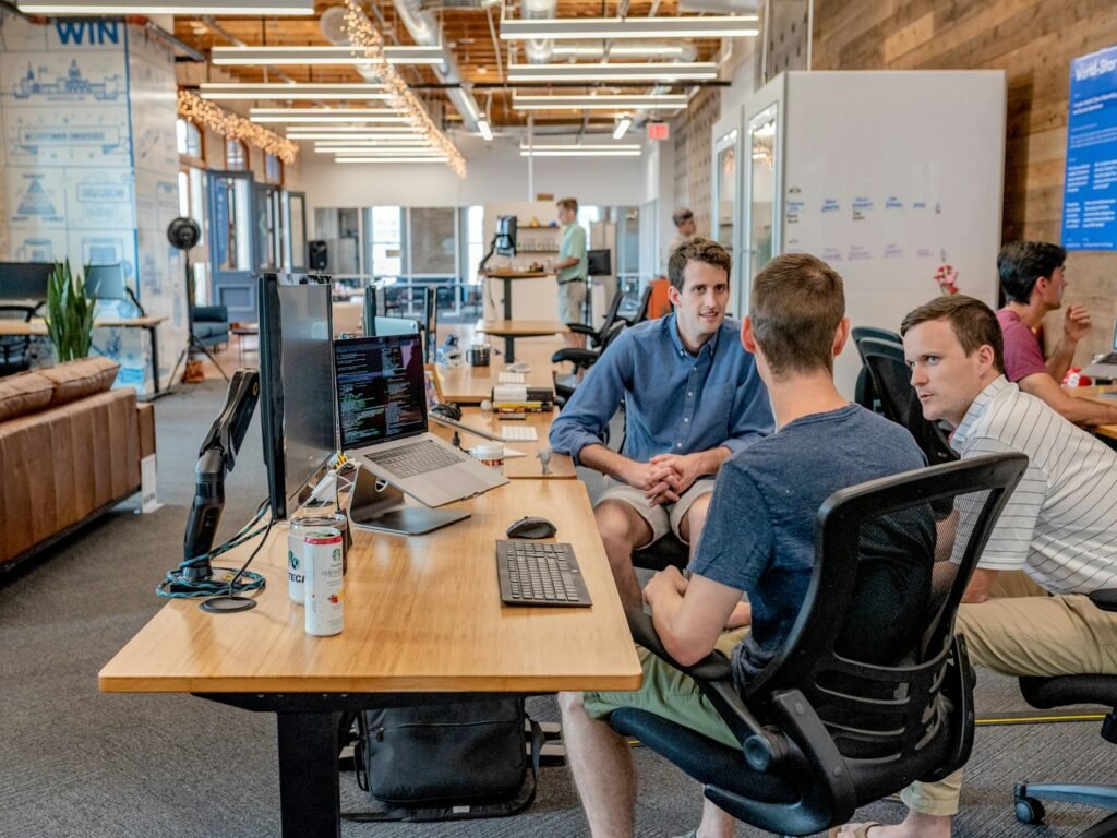 Colleagues working together around a meeting table
